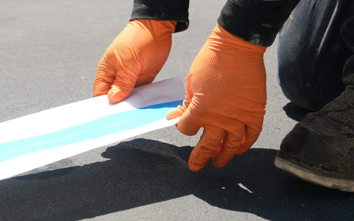 Technician preparing a trenchless pipe liner